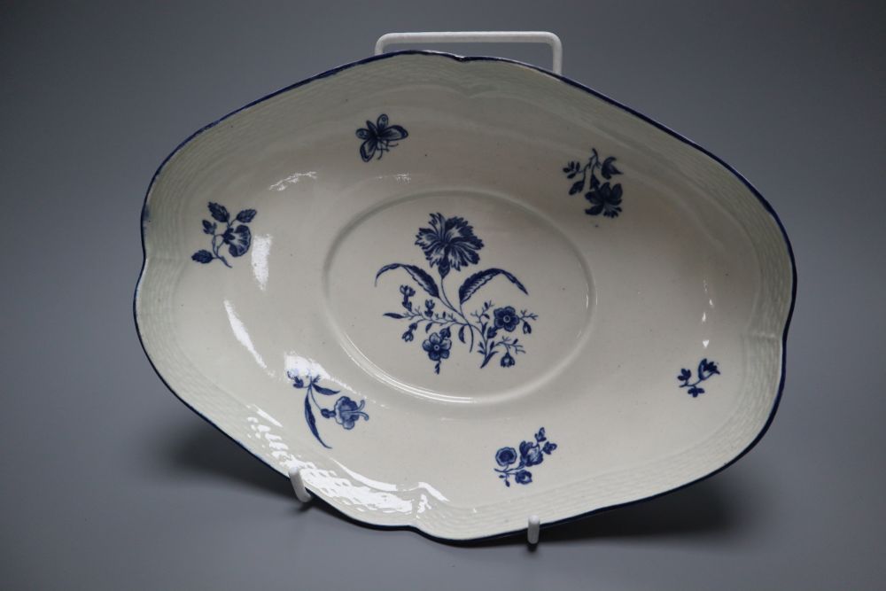 A Worcester Gilliflower pattern dish and stand, 24cm and a pair of Pine Cone pattern plates, 16cm, c.1775,